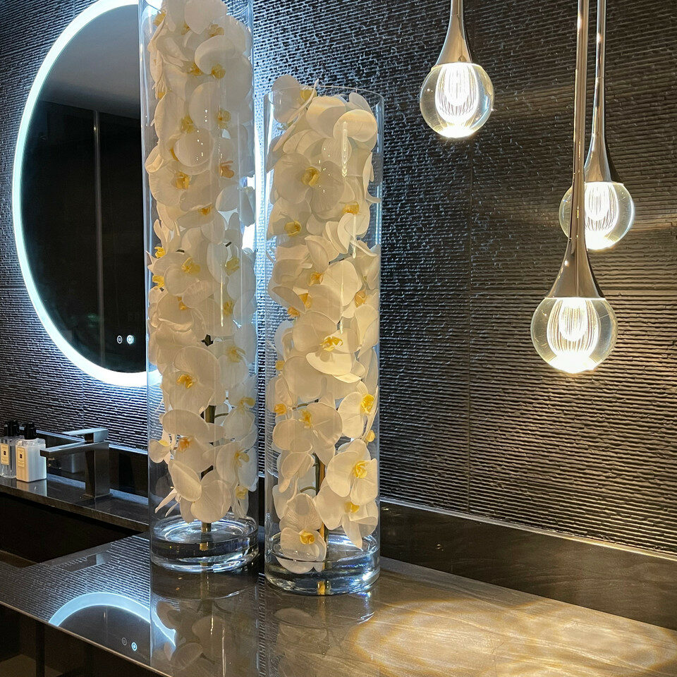 Premium glass cylinder with white phalaenopsis orchids